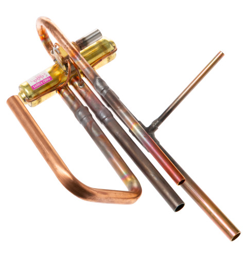 REVERSING VALVE ASSEMBLY