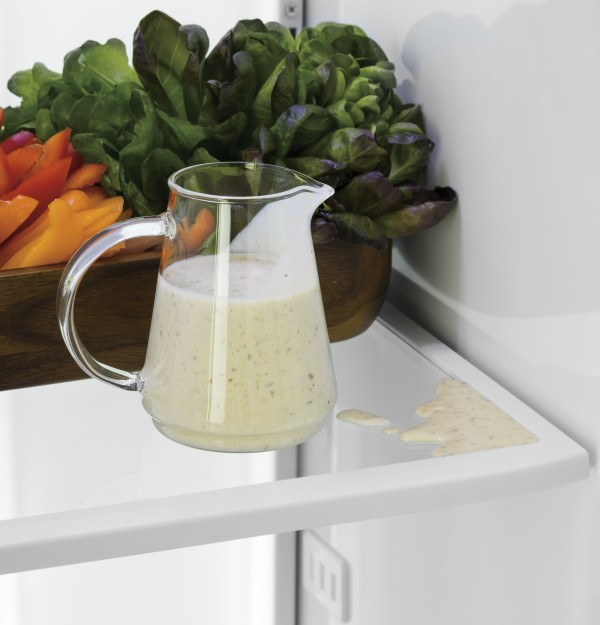 Adjustable spillproof glass shelves