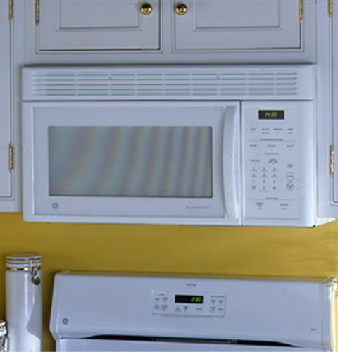 GE® SpacemakerXL® Microwave Oven with SmartControl System, Convenience Cooking Controls and Glass Tray